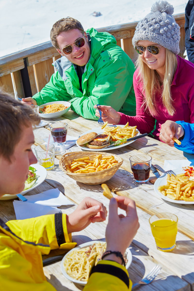 Group of friends enjoying the food from the Saloon